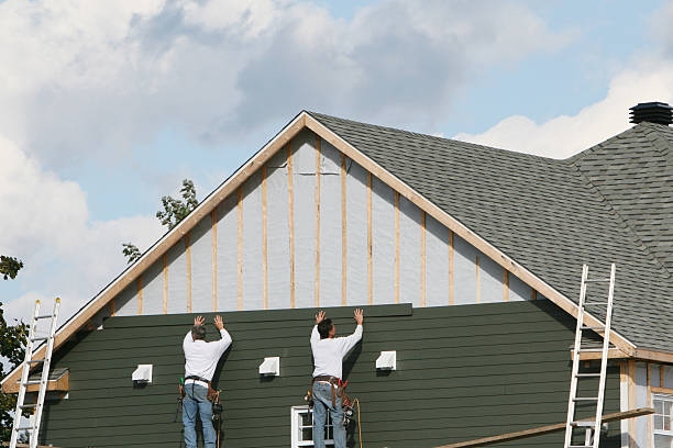 Professional Siding Contractor technician working in Brookville, NY